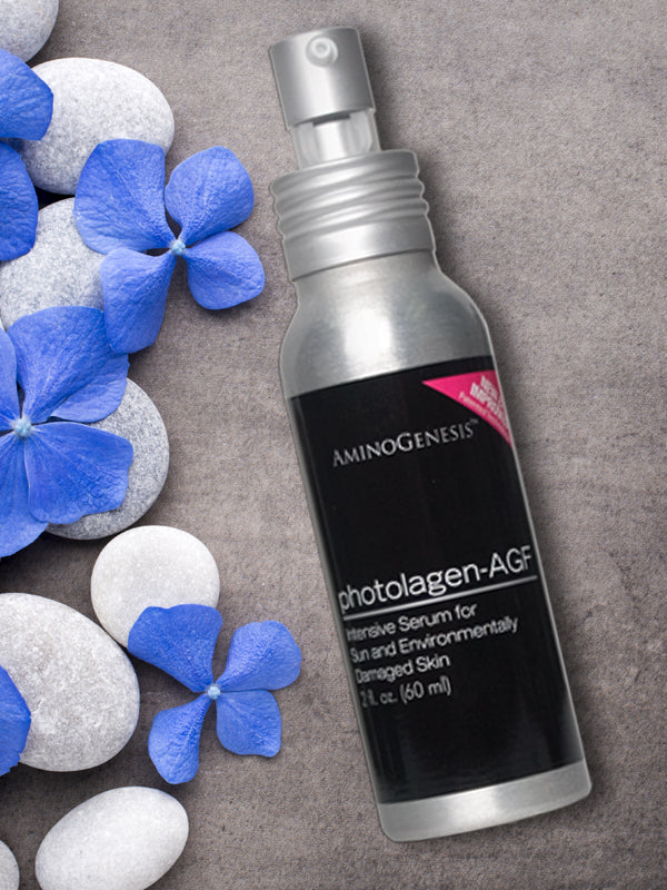 Product Shot. Photolagen-AGF 2 oz with Blue Flowers in Background